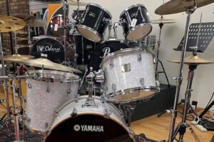 Local music shops Providence buy drums guitars in your area